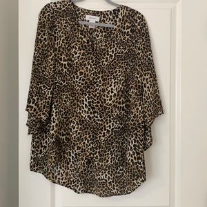 Dressy cheetah top with bell sleeves